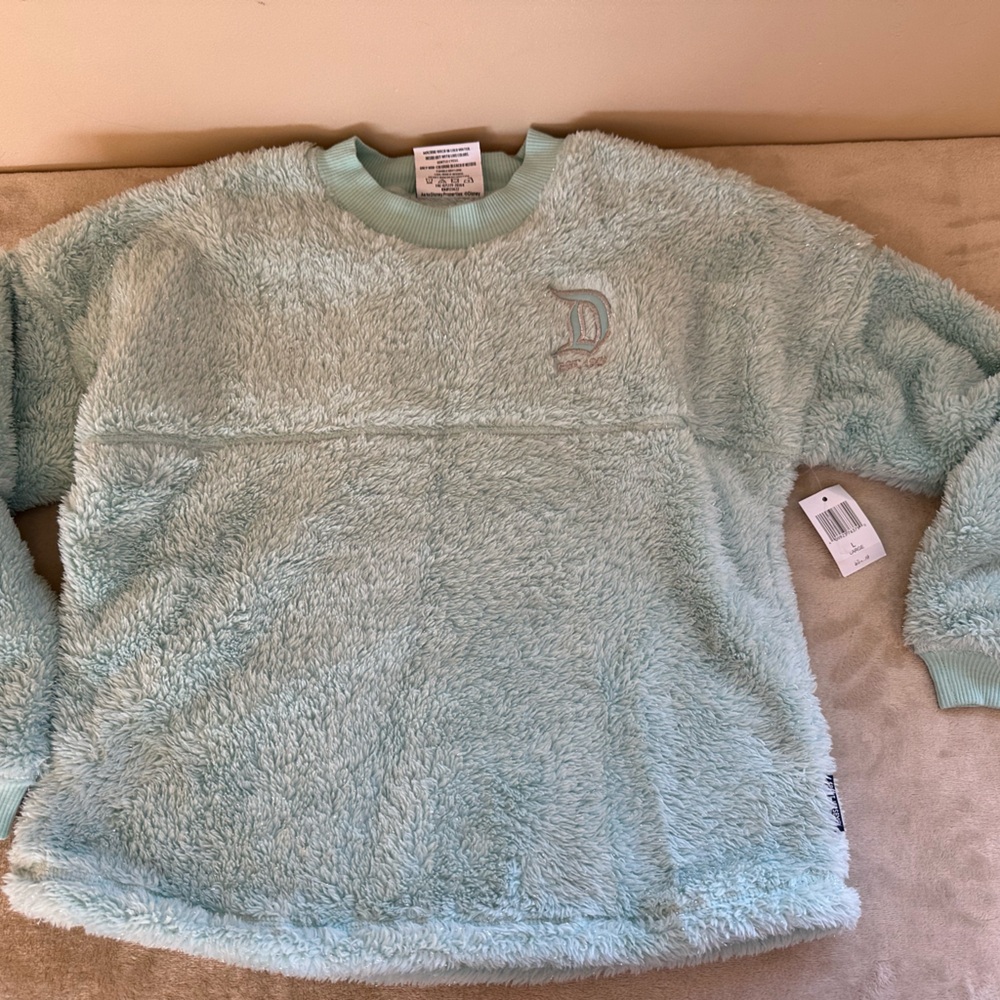 *DISNEYLAND....Sherpa Aqua Fleece SPIRIT JERSEY SPARKLY AQUA COLOR Youth L